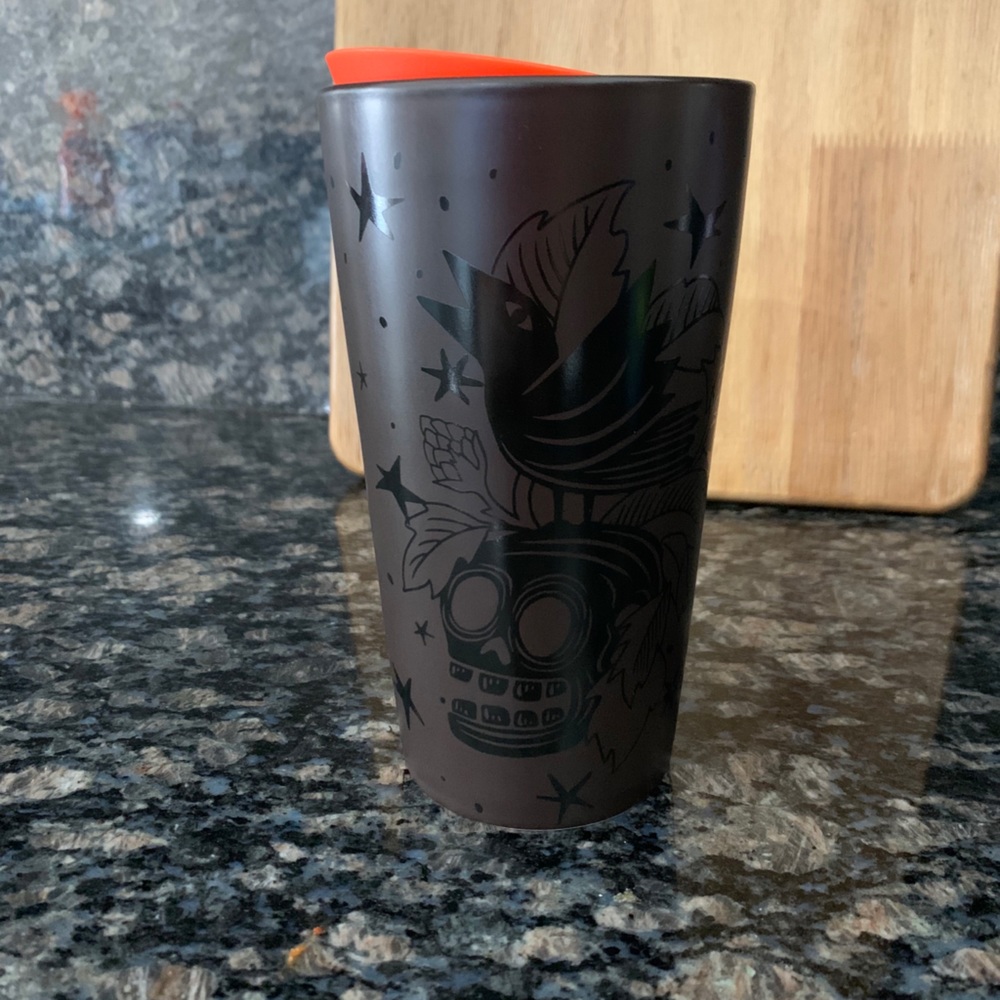 Starbucks ceramic matte black skulls coffee cup.